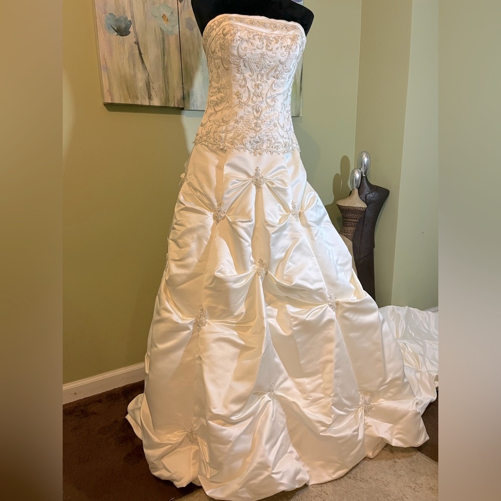 Princess Wedding Gown with a Sleeveless Bodice, Rhinestones and Pickup Skirt.